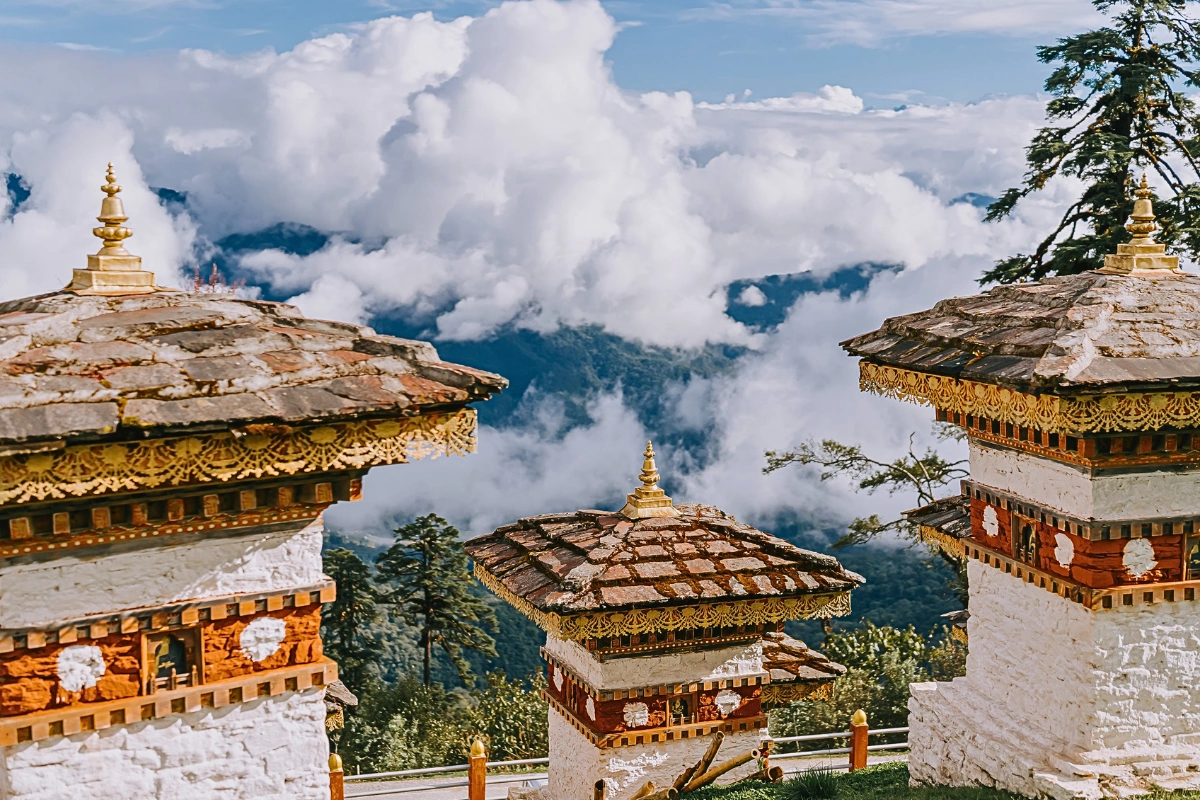 Bhutan travel packages featuring Thimphu Buddha Point, Paro Tiger's Nest monastery, Punakha Dzong landscape views