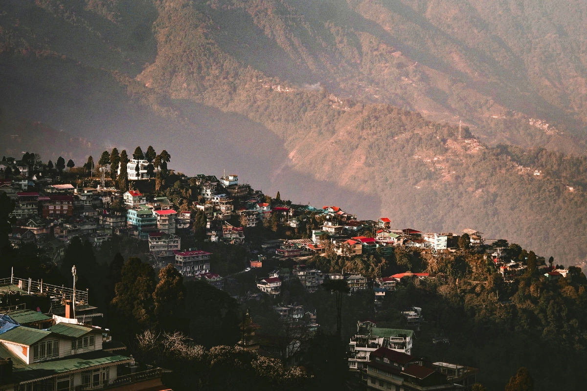 Lepchajagat tourism featuring Lepcha tribal village, ancient forests, Sukhiyapokhri border town, Simana viewpoint, Mirik lake